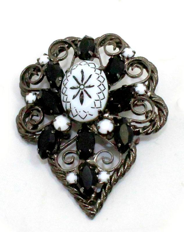 Front view of Black (jet) Cabochons Molded/Cut Brooch
