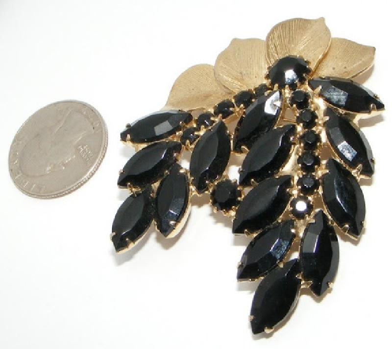 Front view of Black (jet) Navettes Brooch