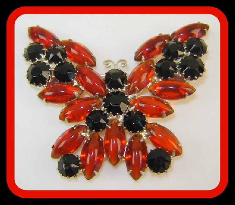 Front view of Orange Navettes Brooch