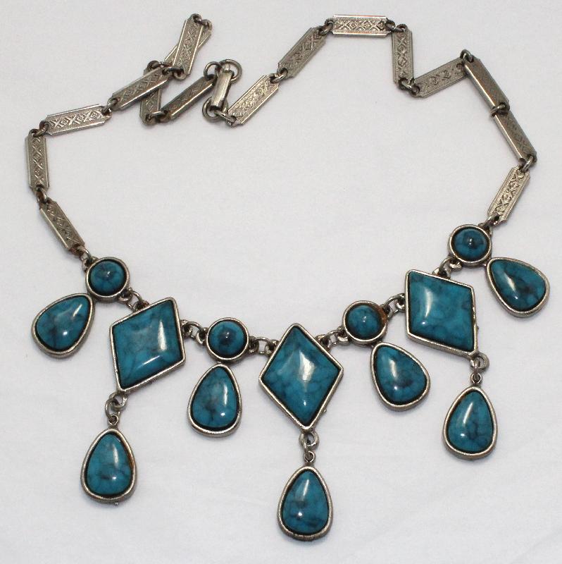 Front view of Turquoise Diamond Plastic Necklace