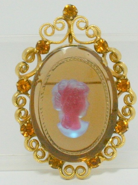 Front view of Topaz Oval Molded/Cut Pin Pendant