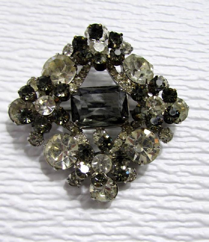 Front view of Gray (black Diamond) Emerald Cut Brooch