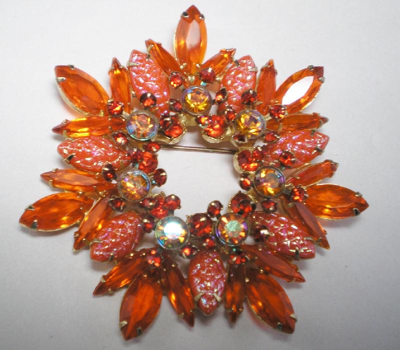 Front view of Orange Navettes Molded/Cut Brooch