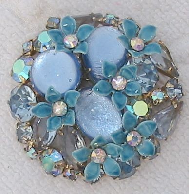 Front view of Blue Cabochons Brooch