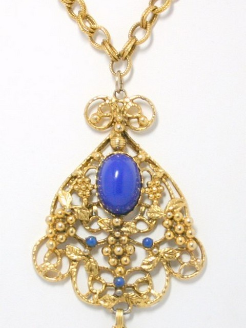 Front view of Blue Cabochons Plastic Pendant