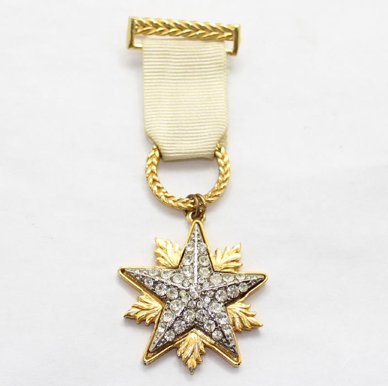 Front view of White (chalk Or Milk) Chatons Only Brooch