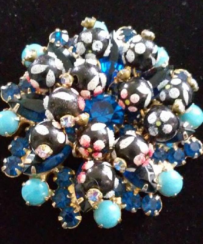 Front view of Blue Cabochons Brooch