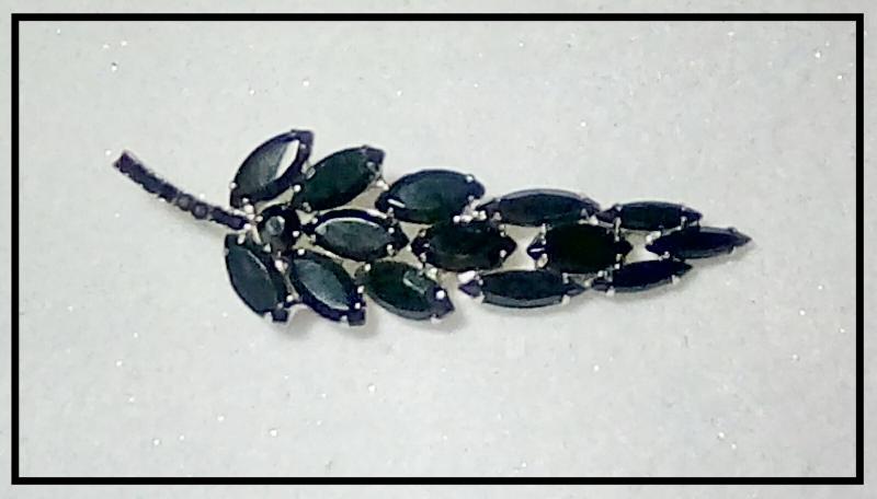 Front view of Black (jet) Navettes Brooch