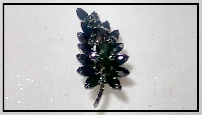 Front view of Black (jet) Navettes Brooch