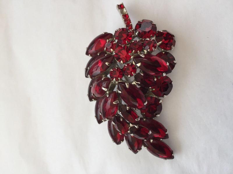 Front view of Red Cabochons Brooch