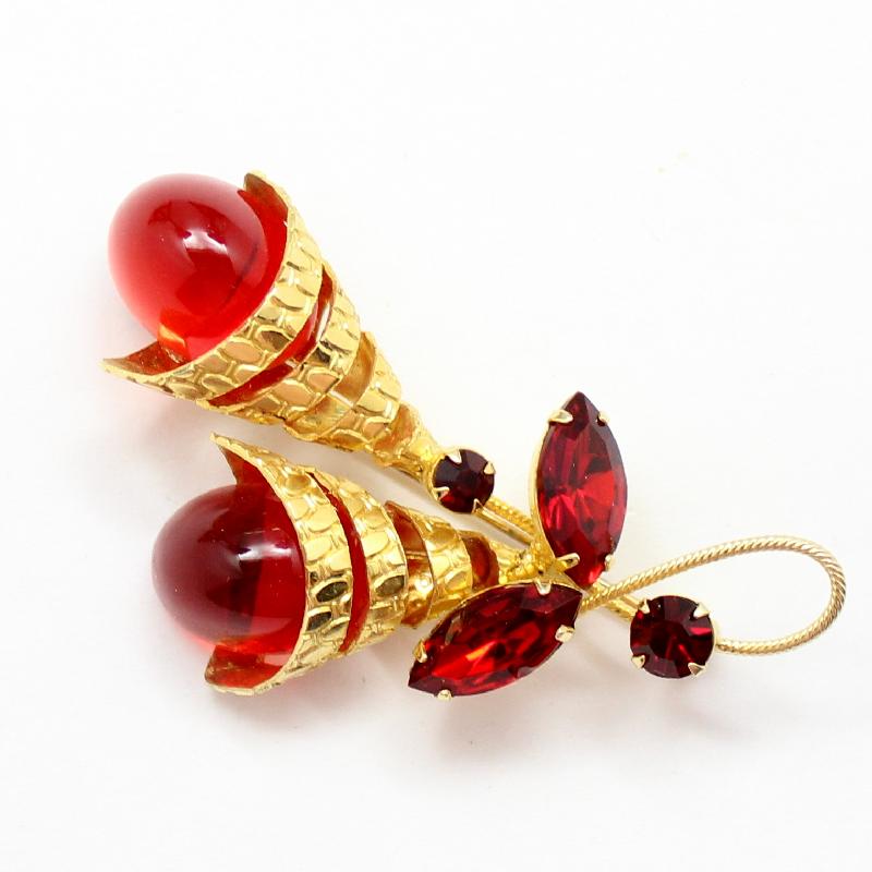 Front view of Red Cabochons Plastic Brooch