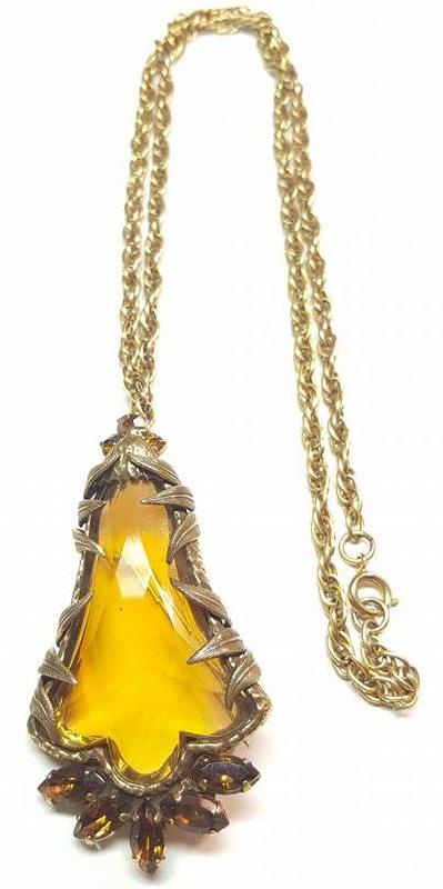 Front view of Topaz Navettes Molded/Cut Pin Pendant