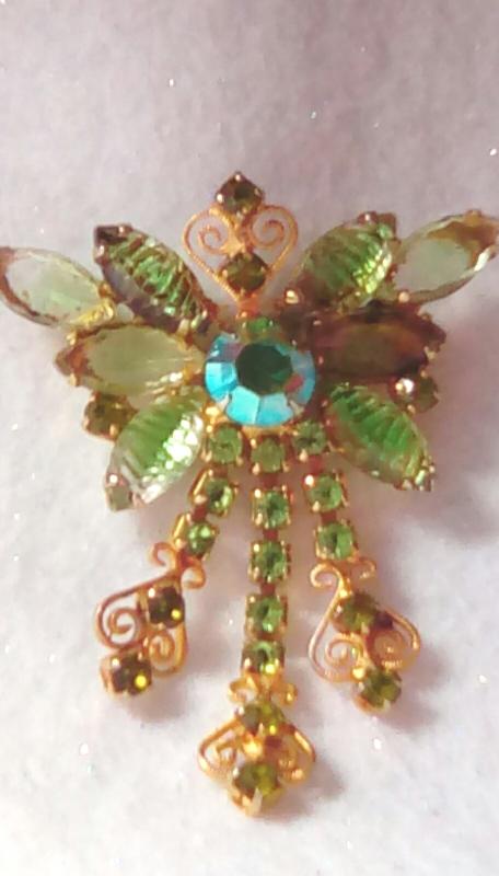 Front view of Green Navettes Givre Brooch