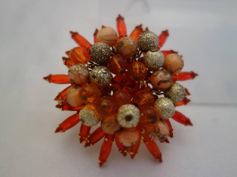 Front view of Orange Navettes Brooch