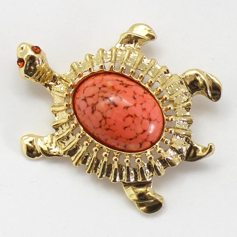 Front view of Orange Oval Spotted Brooch