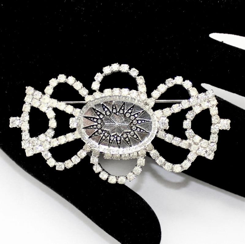 Front view of Clear Oval Molded/Cut Brooch