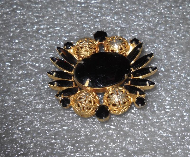 Front view of Black (jet) Navettes Brooch