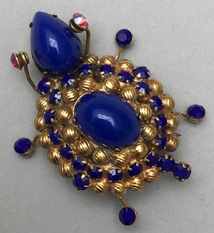 Front view of Blue Cabochons Plastic Brooch