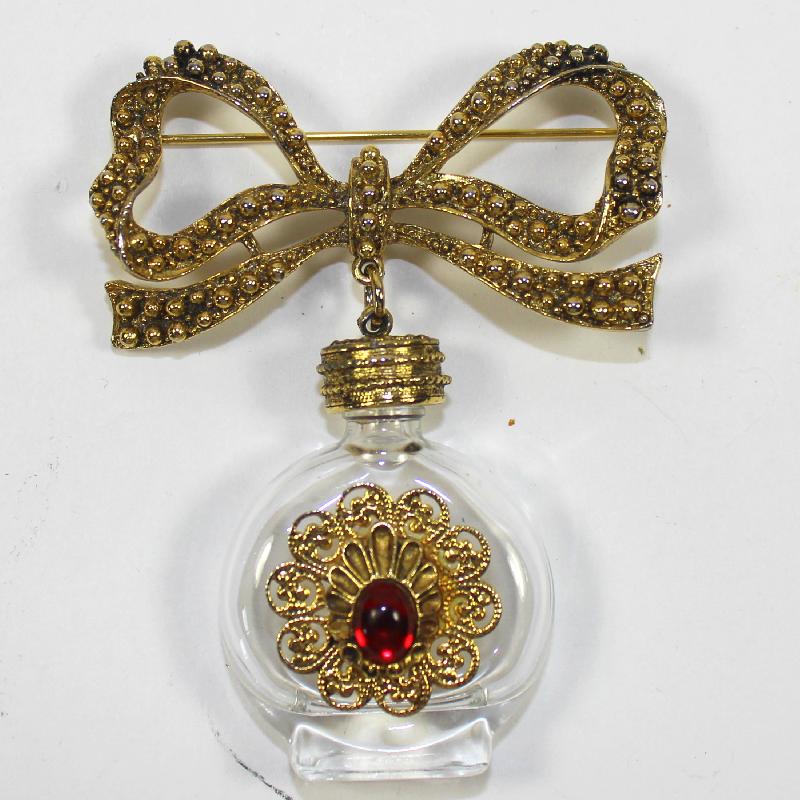 Front view of Red Cabochons Brooch
