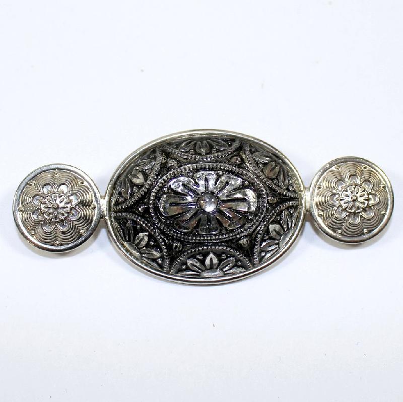 Front view of Black (jet) Cabochons Molded/Cut Brooch