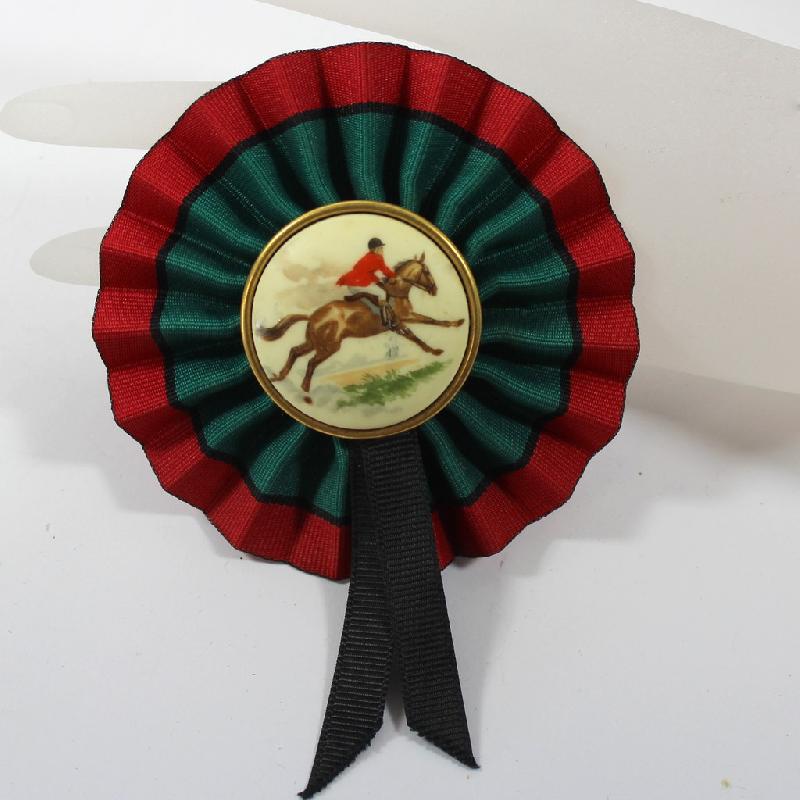 Front view of Red Painted (hand/Transfer) Brooch