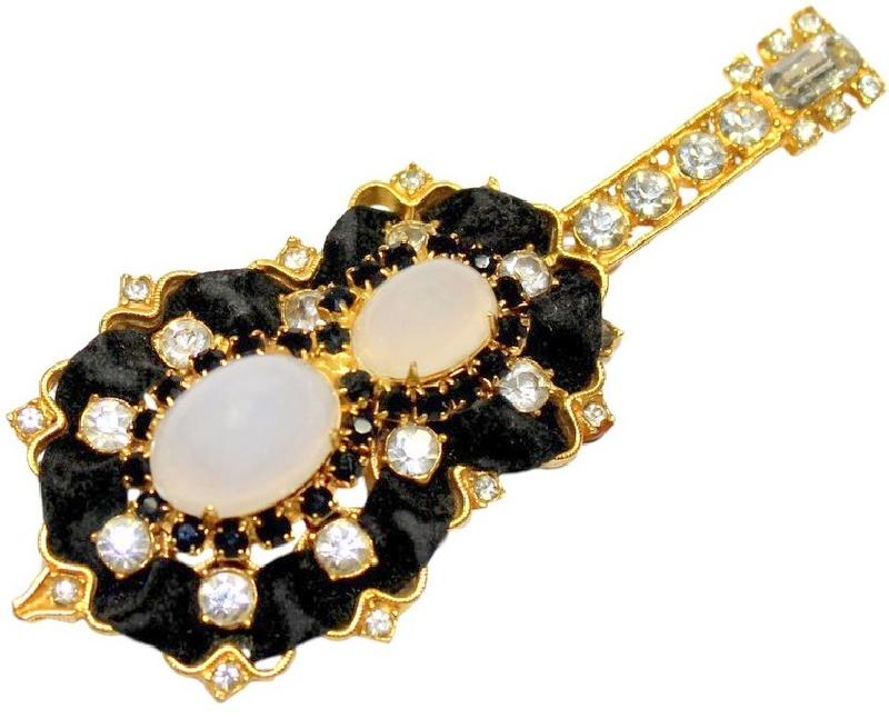 Front view of Black (jet) Cabochons Brooch