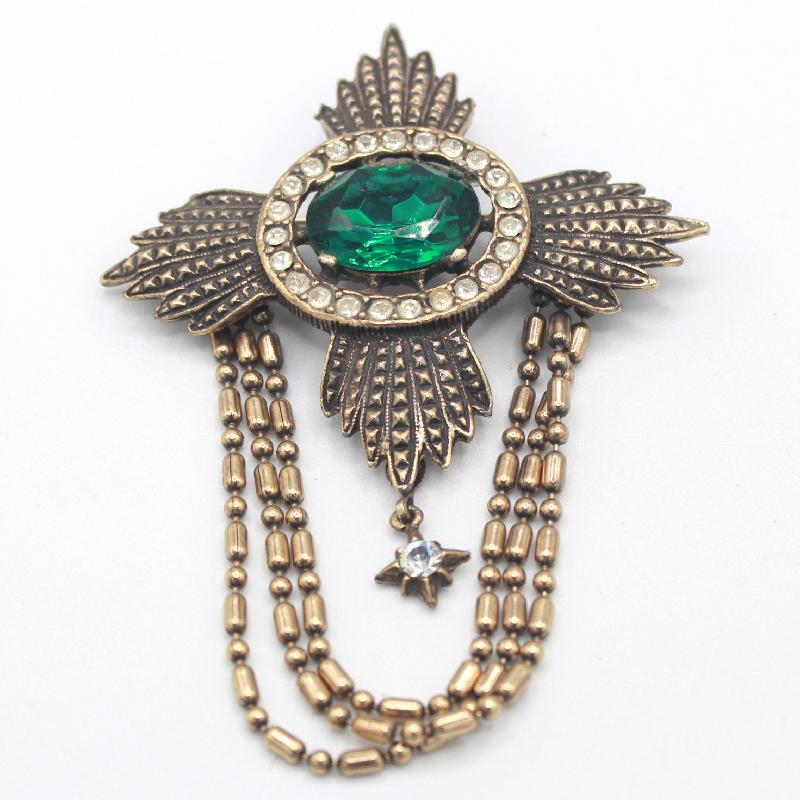 Front view of Green Oval Brooch