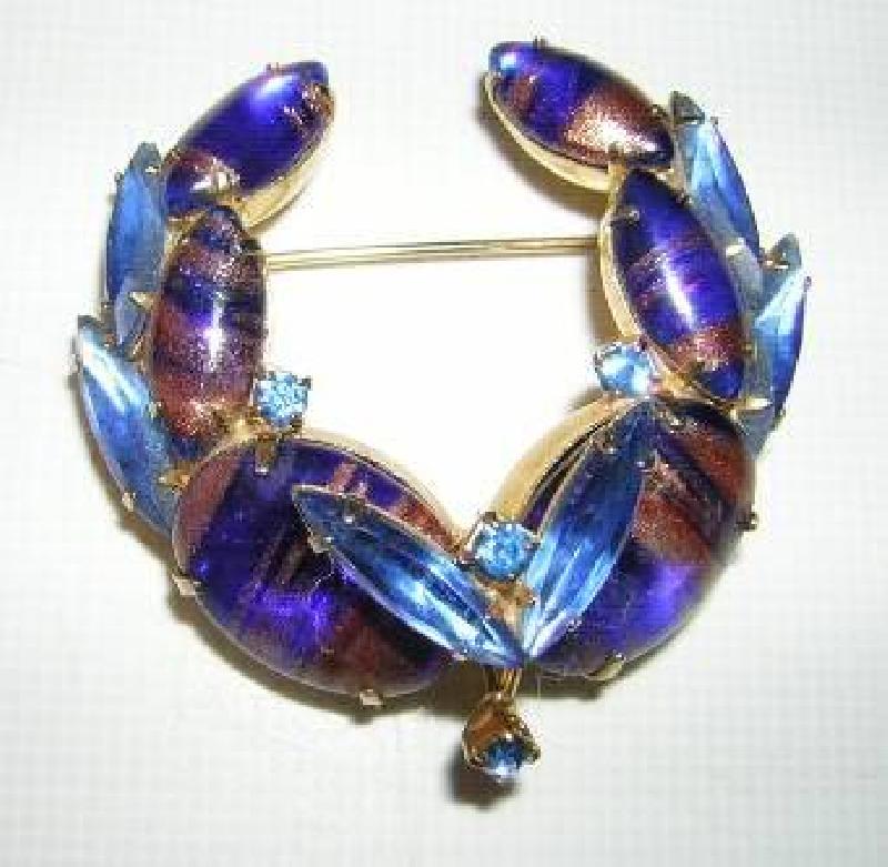 Front view of Blue Cabochons Striped Brooch